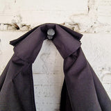 Close-up of waterproof fabric texture and precise embroidery threadwork