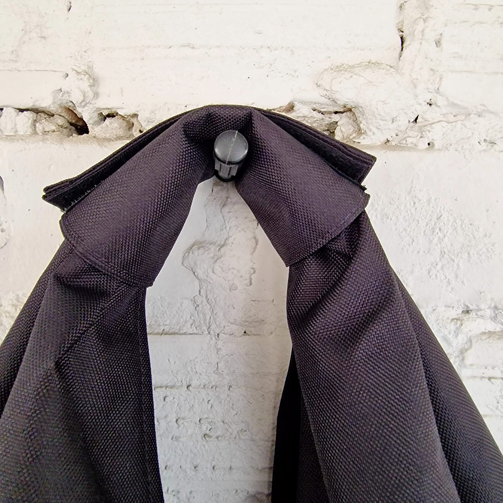 Close-up of waterproof fabric texture and precise embroidery threadwork