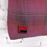 Close-up of burgundy plaid fabric tote bag with decorative red stitched detail – handmade cotton hobo purse