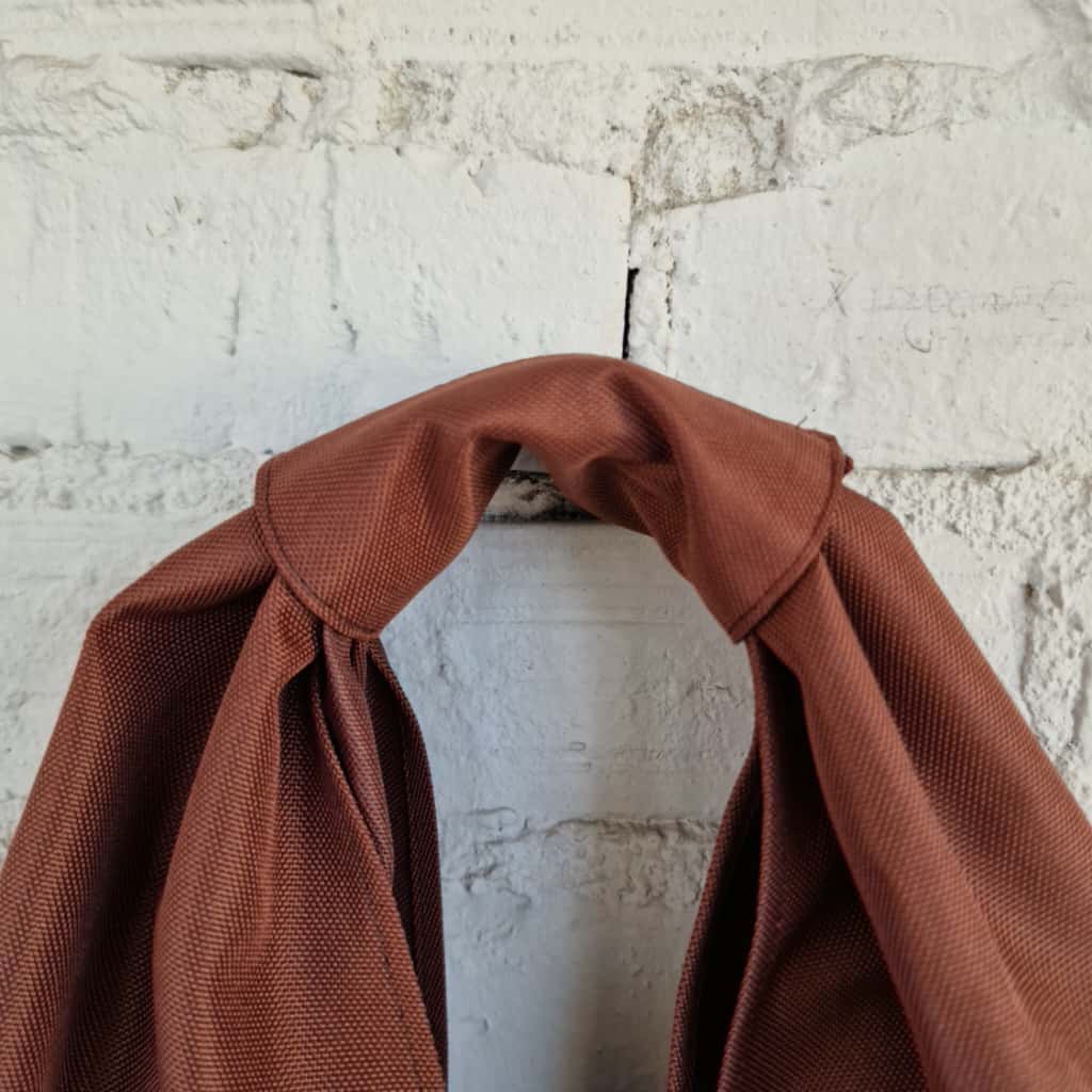 Close-up of handle knot – waterproof impregnated fabric detail