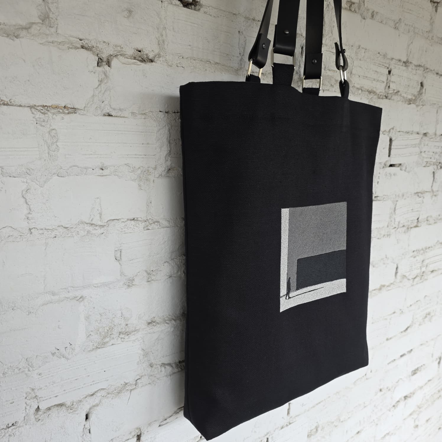 The Path Finder black linen and cotton tote bag with detachable leather handles