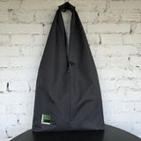Minimalist black HOBO bag “The Path Finder” front view — handmade water-resistant tote