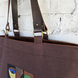 Genuine leather handles detail on linen cotton tote bag