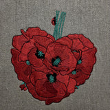 Embroidered poppy heart design