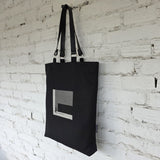 Black linen and cotton tote bag with khaki embroidered The Path Finder design