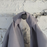 Handle detail of light grey unisex hobo bag – durable waterproof fabric texture